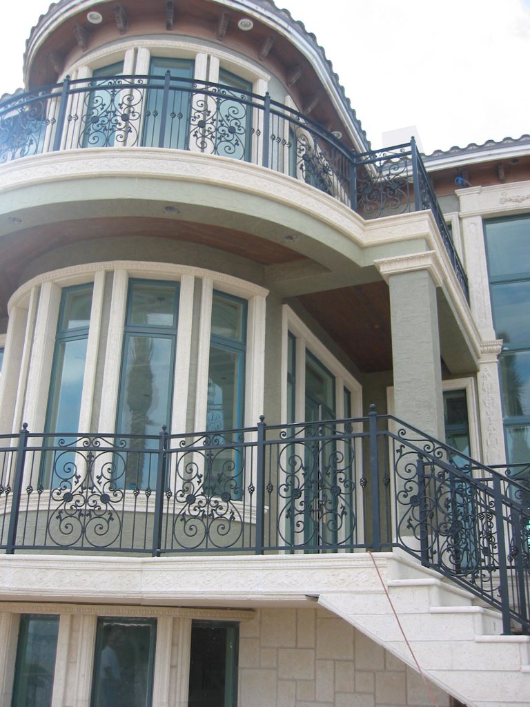 Custom-built residential home with ornate iron balconies — Miami